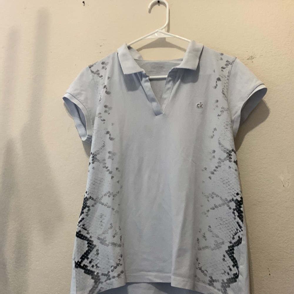 Calvin Klein white collared shirt with black white pattern